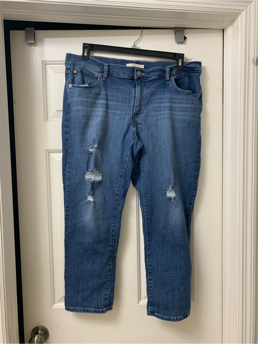 Women's Levi Distressed Mid Wash Blue Jeans